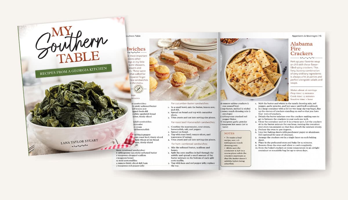 Cookbook titled My Southern Table with an open spread showing recipes and food photos, including greens and crackers.