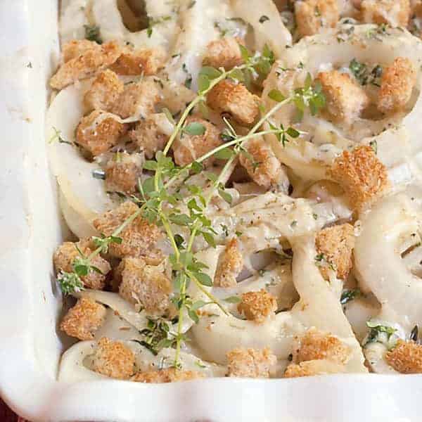 This delicious Vidalia Onion Gratin uses sweet as sugar onions and rich Gruyere cheese for a perfect pairing with pork or chicken. https://www.lanascooking.com/vidalia-onion-gratin/