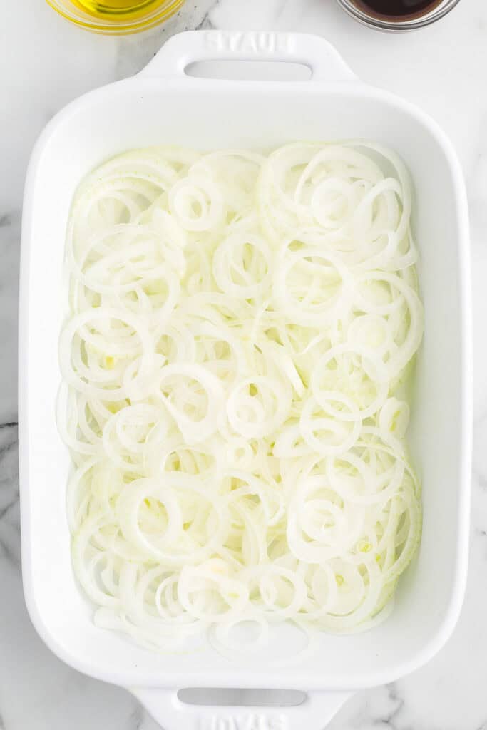 Onions in a baking pan.