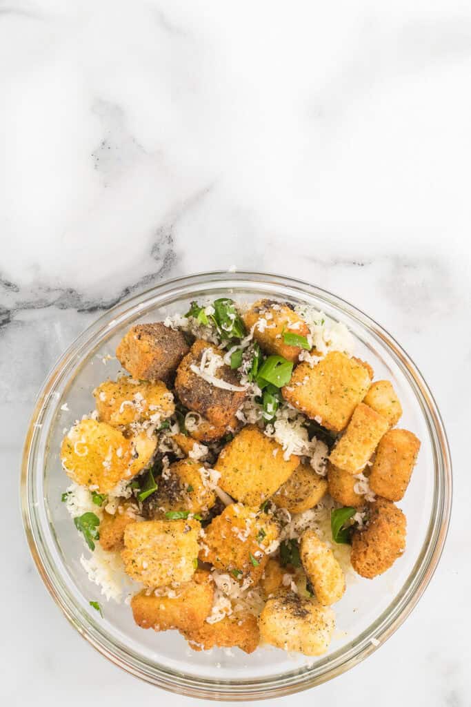 Crouton topping mixture in a bowl.