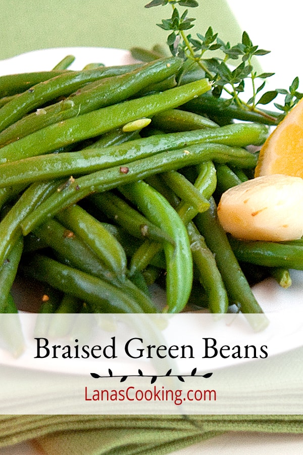 Braised Green Beans - very tender haricot verts braised in chicken stock and garlic, seasoned with olive oil and lemon juice.  https://www.lanascooking.com/braised-green-beans/
