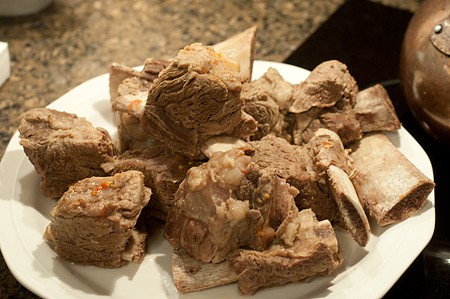 Cooked short ribs removed from the pot.