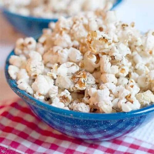 Offer your guests a bowl of Garlic Butter and Herb Popcorn. It's popcorn coated with garlic infused butter and tossed with herbs and celery seed. https://www.lanascooking.com/garlic-butter-and-herb-popcorn/