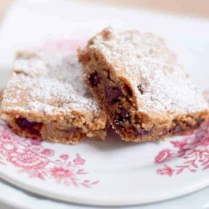 Classic blondies with the addition of chocolate chips and sweet, tart dried cherries. A sweet treat for after school, after work, or after dinner. https://www.lanascooking.com/blondies-with-chocolate-chips-and-cherries/