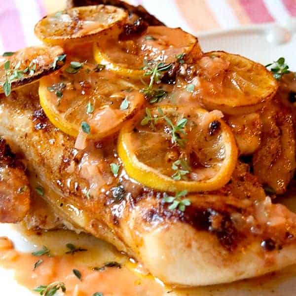 Buttery Barbecued Chicken - oven baked chicken with a rich, tangy, and buttery barbecue sauce. Good for cooler weather since no outdoor cooking is required. https://www.lanascooking.com/buttery-barbecued-chicken/