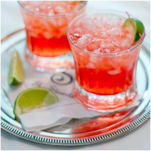 A Scarlett O'Hara cocktail containing Southern Comfort, cranberry juice, and lime juice. Just the thing for a southern celebration. https://www.lanascooking.com/celebrating-with-creative-culinary-scarlett-ohara-cocktail/