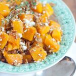 Roasted Butternut Squash with Pecans and Blue Cheese in a serving bowl.