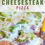 A rectangular cheesesteak pizza topped with melted cheese, green peppers, and onions on a wooden board. Text overlay reads Cheesesteak Pizza with lanascooking.com in the corner.