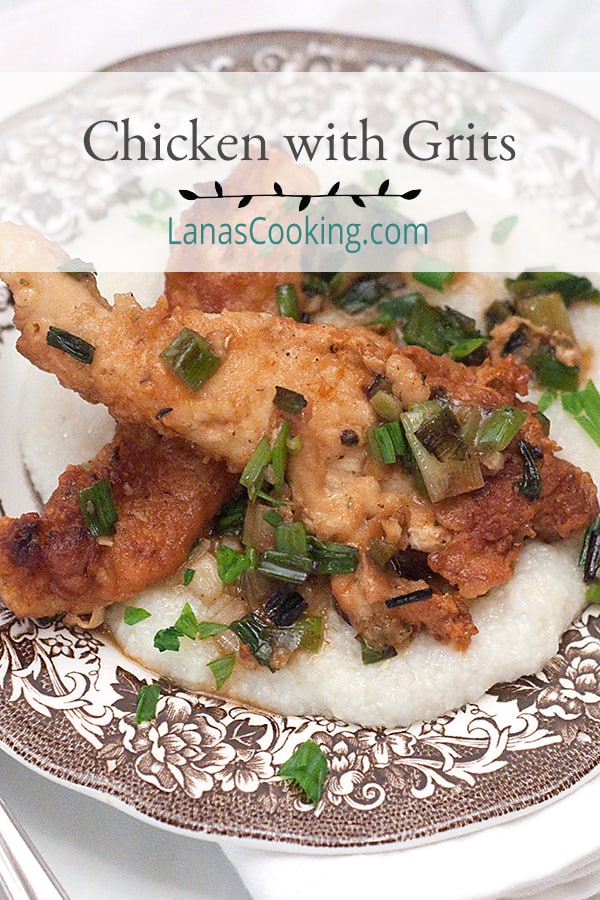 Chicken with Grits for a Cozy Winter Supper - Creamy, buttery grits topped with fried chicken strips and a green onion pan sauce. https://www.lanascooking.com/chicken-with-grits/