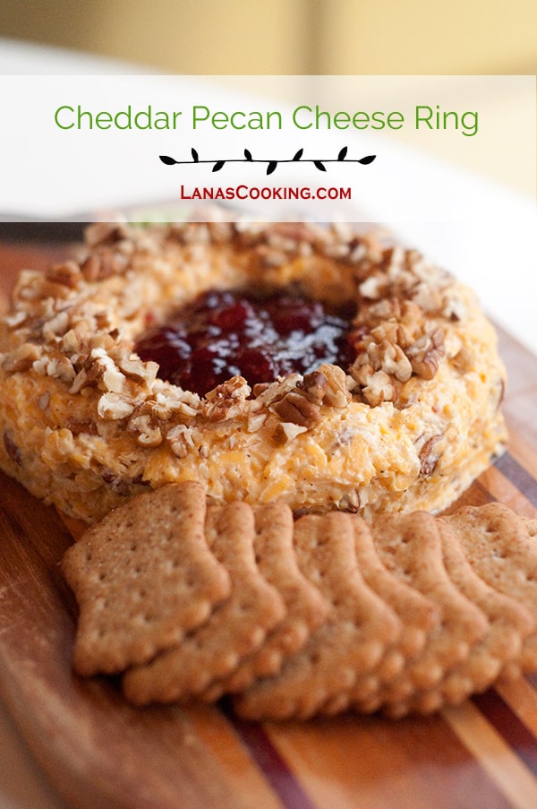 Cheddar Pecan Cheese Ring with Strawberry Preserves - A vintage cheese ring recipe attributed to first lady Rosalynn Carter. Good for any get together from football games, to movie night, to wine parties. https://www.lanascooking.com/cheddar-pecan-cheese-ring-with-strawberry-preserves