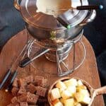 A classic cheese fondue using both Swiss and Gruyere cheese with bread and fruit dippers. One of our favorites for a relaxed Sunday afternoon. https://www.lanascooking.com/cheese-fondue/
