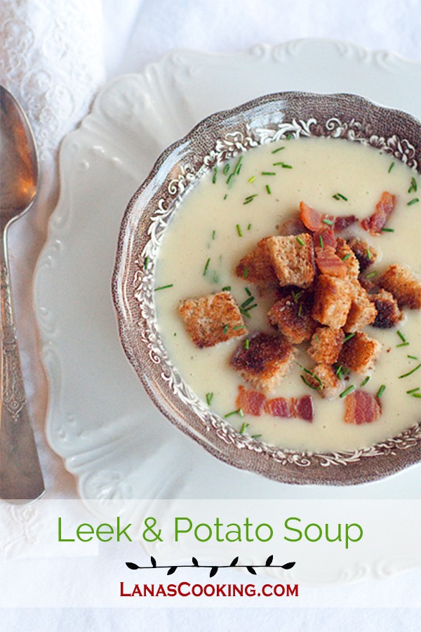 Leek and potato soup in a serving bowl.
