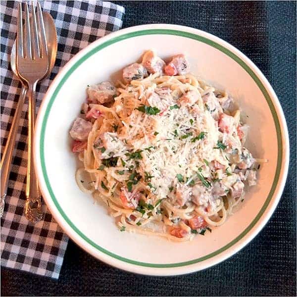 Creamy Ham and Red Bell Pepper Pasta - A recipe for a rich, creamy ham and red bell pepper pasta sauce using cream, cream cheese, Parmesan, and basil. https://www.lanascooking.com/creamy-ham-and-red-bell-pepper-pasta/