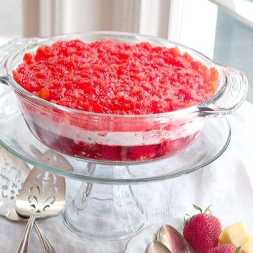 This Strawberry Banana Jello Mold is a refreshing summer-y jello salad with strawberries, bananas, and pineapple. https://www.lanascooking.com/strawberry-banana-jello-mold/