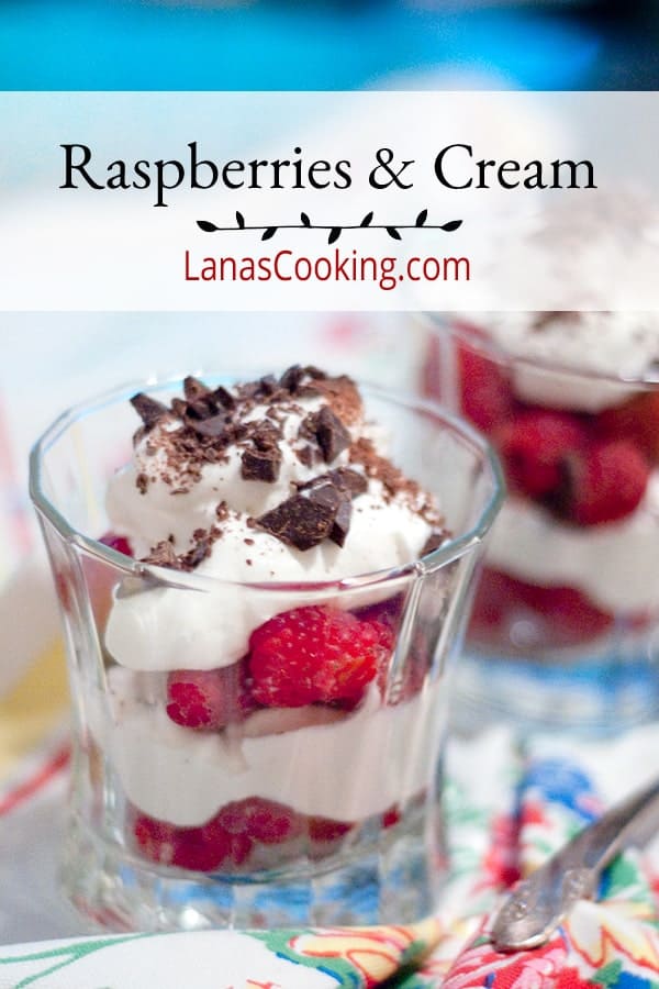 Raspberries and Cream - perfectly ripe, fresh raspberries topped with sweetened whipped cream and a sprinkling of chopped chocolate. https://www.lanascooking.com/raspberries-and-cream/