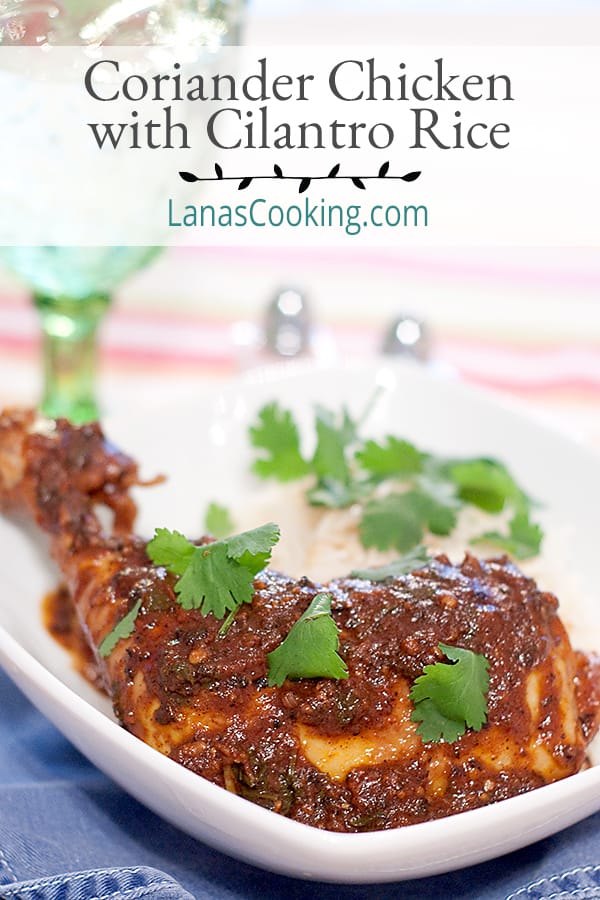 A serving of coriander chicken and cilantro rice on a white plate.