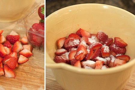 Washed and chopped strawberries with sugar on them in a bowl.