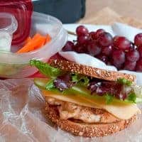 This Grilled Chicken, Apple, and Gouda Sandwich on whole grain bread is a healthy, hearty lunch option. Treat yourself to a real lunch break! https://www.lanascooking.com/grilled-chicken-apple-gouda-sandwich