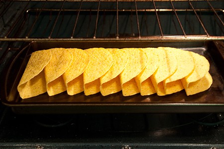 Corn tortillas warming in the oven.
