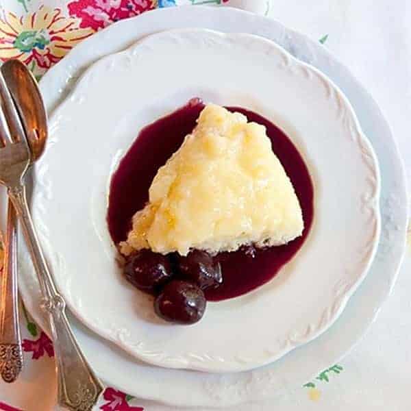 A vintage recipe for Lemon Pudding Cake - the mixture separates into layers while baking! From @NevrEnoughThyme http://www.lanascooking.com/lemon-pudding-cake-with-cherry-coulis/