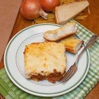 A traditional Greek recipe, this Pastitsio is adapted to more suit southern tastes. Layers of pasta and meat sauce topped with a creamy, cheesy bechamel. https://www.lanascooking.com/pastitsio/