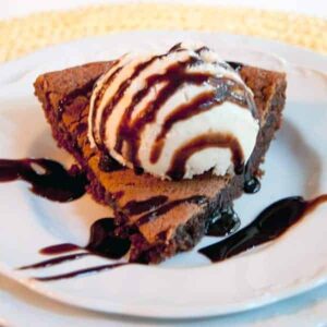 This Vintage Hot Fudge Pie is a cross between a brownie and a cookie. A real old-fashioned treat that's perfect for chocolate lovers of all ages! https://www.lanascooking.com/vintage-hot-fudge-pie/