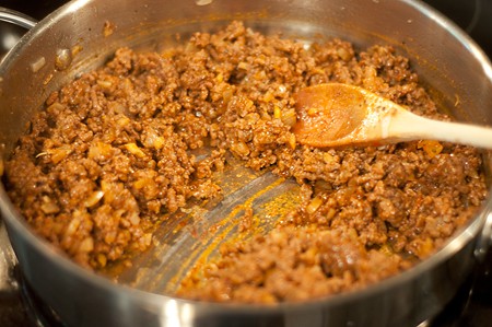 Cooked filling in a skillet.
