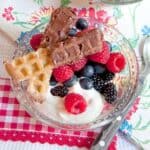 Chocolate Caramel Dipped Waffle Sticks with Fresh Berries and Cream - this recipe uses purchased frosting to make chocolate caramel dipped waffle sticks. https://www.lanascooking.com/chocolate-caramel-dipped-waffle-sticks-fresh-berries-cream/