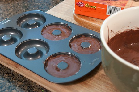 Fill the doughnut pan