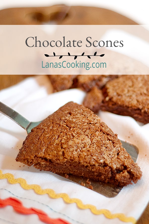 Chocolate Scones - A special dessert scone that is sweeter than a traditional scone with a crunchy sugary topping. Enjoy with a cup of tea or coffee. https://www.lanascooking.com/chocolate-scones/