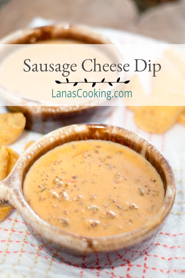 Sausage Cheese Dip - That famous cheese and salsa dip with a little extra something. Warm, gooey, melty cheese dip with sausage! https://www.lanascooking.com/sausage-cheese-dip/
