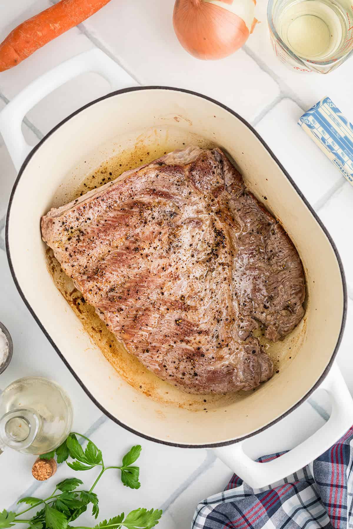Browning ribs in a Dutch oven.