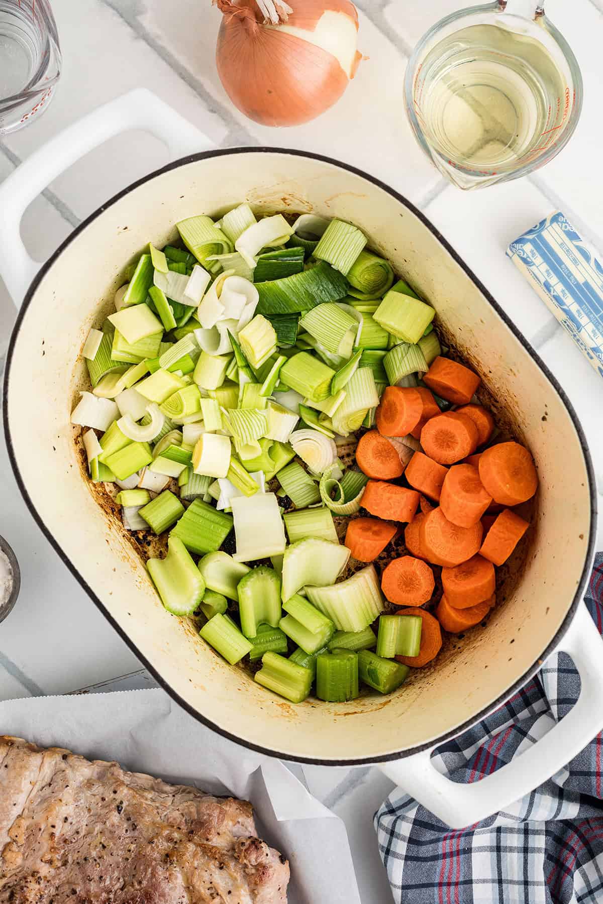 Vegetables added to the Dutch oven.