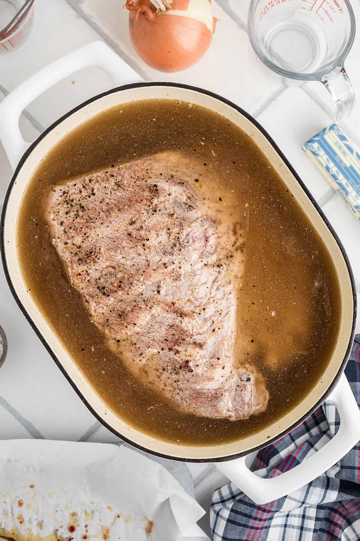 Ribs and water added to the pot.