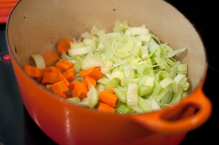 Add aromatic vegetables to pot