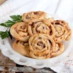 Prosciutto Ricotta Pinwheels - use purchased crescent rolls to make these quick and easy party appetizers with the flavors of Italy! https://www.lanascooking.com/prosciutto-ricotta-pinwheels/