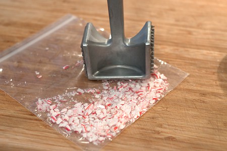 Crushing candy canes for Quick and Easy Decorated Christmas Cookies