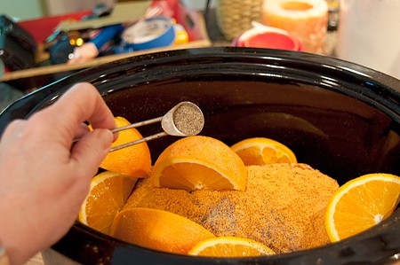 Adding all ingredients to the slow cooker.