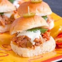 Southwest Pulled Pork Sliders from the Slow Cooker will be a game day favorite. They're made with slow cooked pulled pork seasoned with southwest flavors. https://www.lanascooking.com/southwest-pulled-pork-sliders-slow-cooker