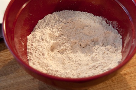 Butter rubbed into flour mixture in mixing bowl