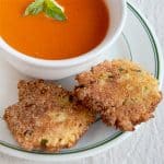 These crispy Cornmeal Scallion Fritters are the perfect accompaniment to soups and stews and are a great side with fresh summer vegetables. https://www.lanascooking.com/cornmeal-scallion-fritters/