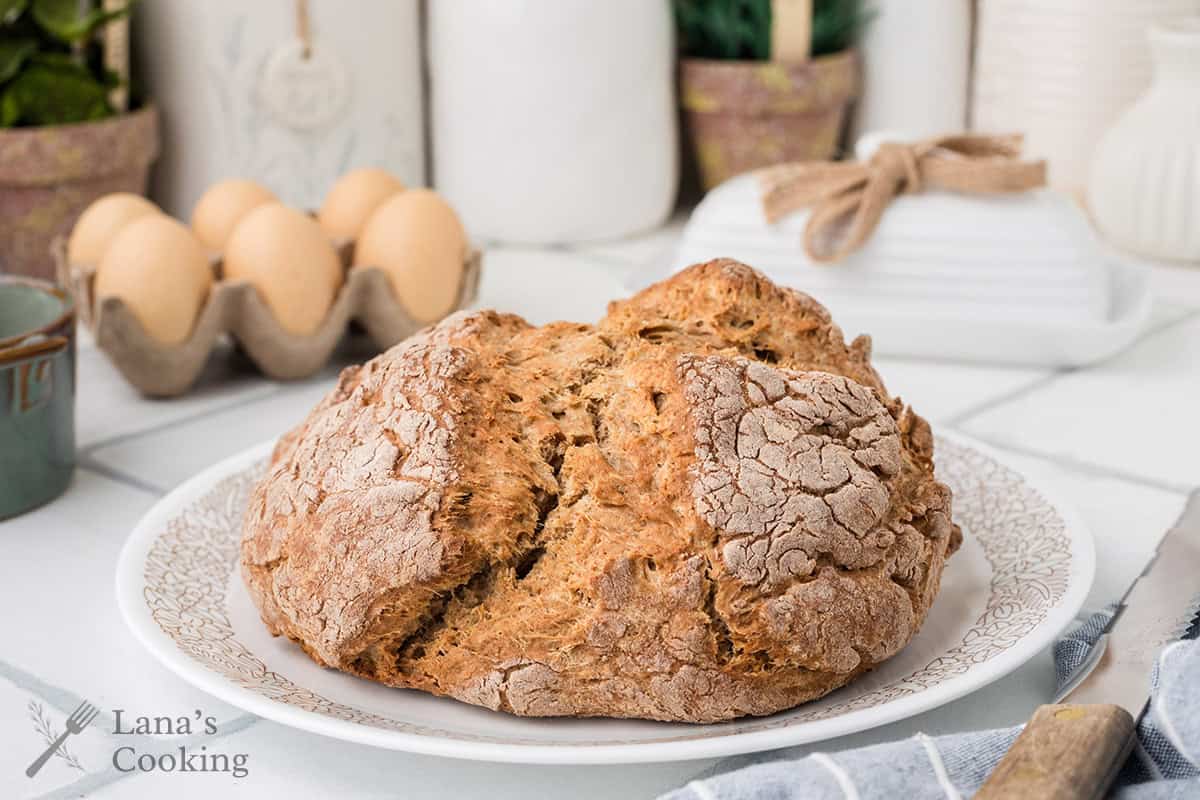 A loaf of soda bread on a plate.