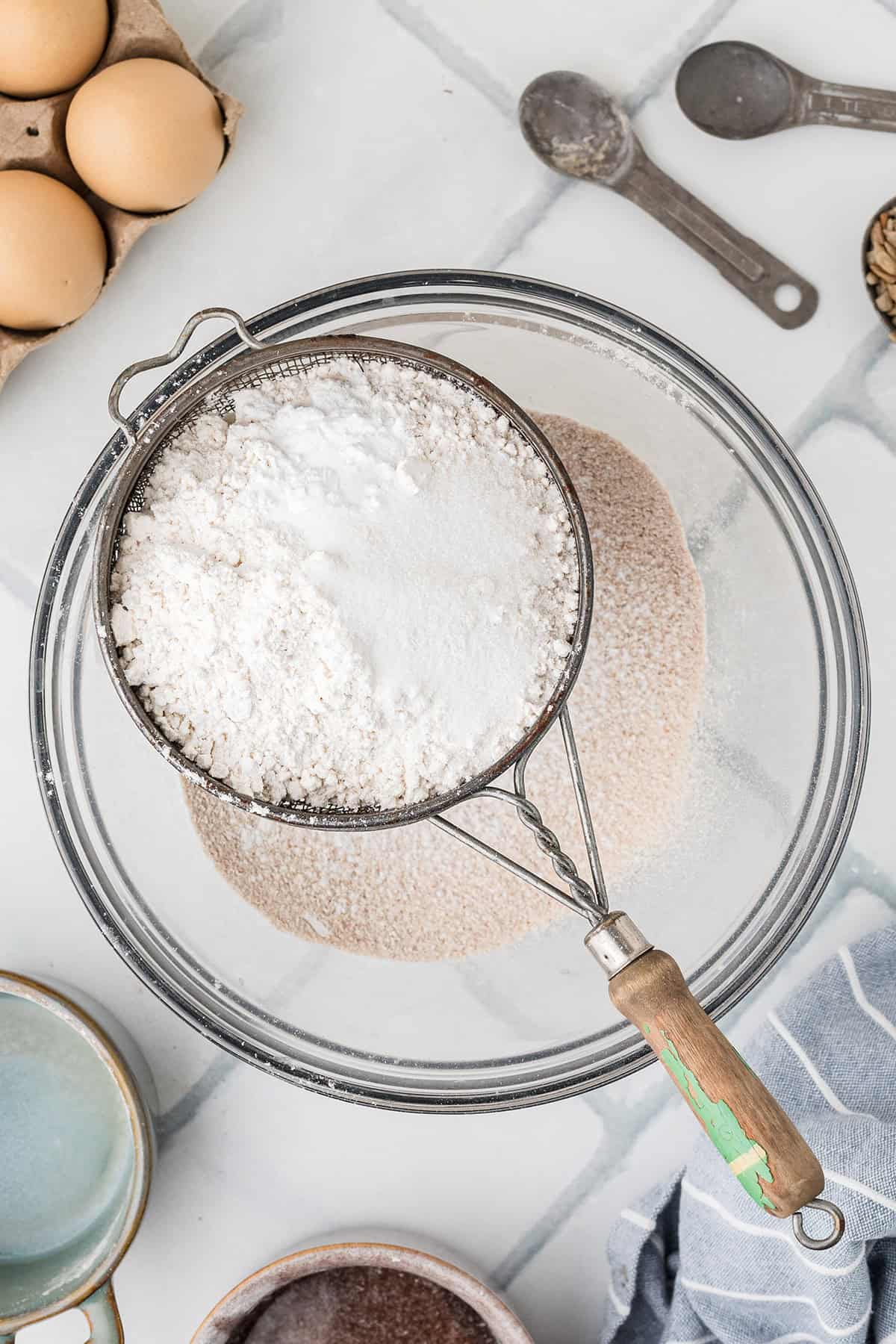 Sifting the dry ingredients.