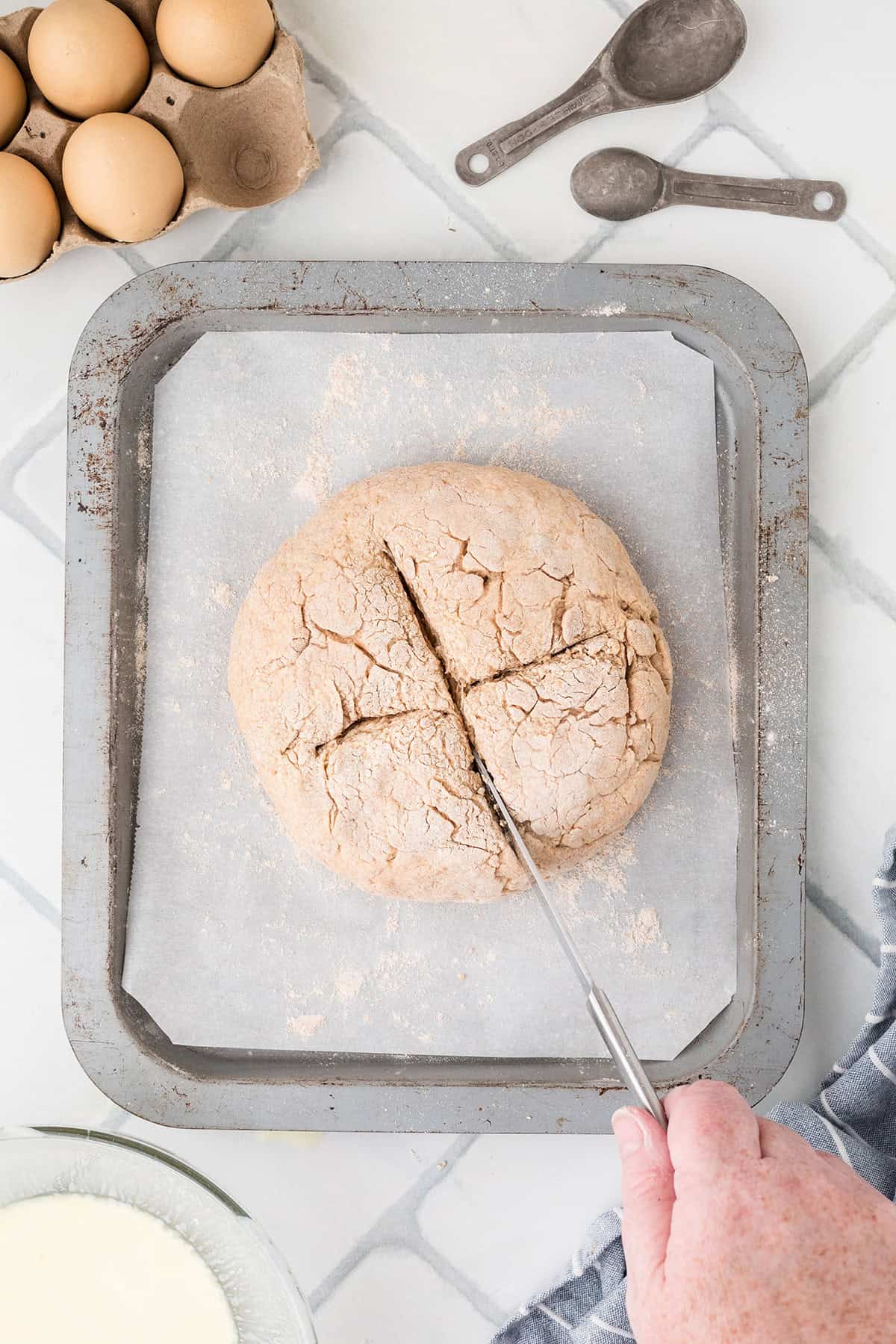 Shaped loaf on a baking sheet.