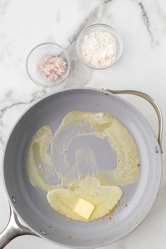 Melted butter in a frying pan.