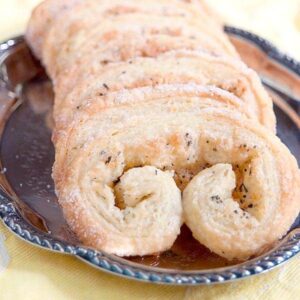 Lemon Basil Palmiers - palmiers made from frozen puff pastry with lemon and basil added to the sugar mixture. Great light dessert or snack. https://www.lanascooking.com/lemon-basil-palmiers/
