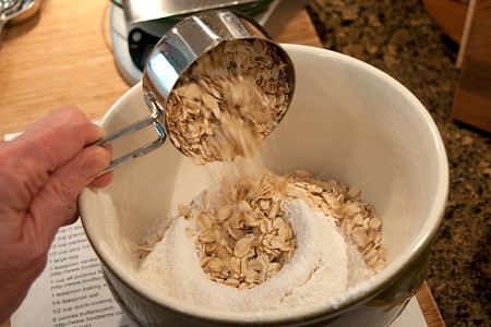 Measuring the dry ingredients into a bowl.