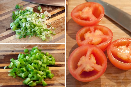 Prepping scallions, bell pepper, and tomatoes.