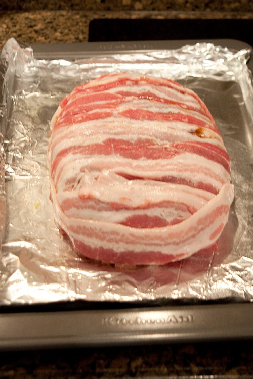Completely cover the meatloaf with bacon