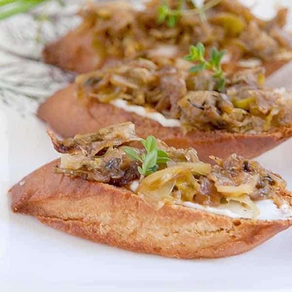 Melange of Onions - a mixture of several varieties of onions, slow cooked until golden brown and caramelized. Use as a sandwich topping or in soups or dips. https://www.lanascooking.com/melange-onions/